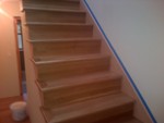 White oak craftsmen style stairs featuring Glitsa Max  satin finish