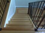 premium glued down hardwood stairs in red oak quarter sawn rift with american black walnut